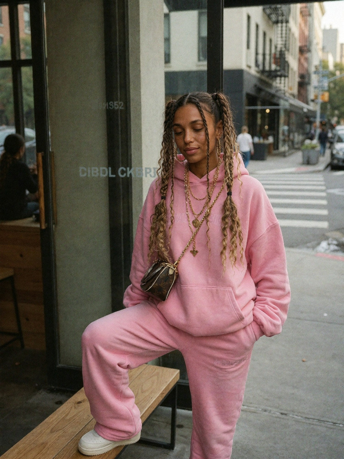 Mila pausing during a city day before choosing her next direction.